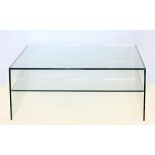 Property of a lady - a modern plate glass square two tier coffee table, 39.4ins. (100cms.) square.
