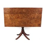 Property of a gentleman - a burr elm rectangular topped table, on associated turned column & sabre