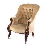 Property of a gentleman - a Victorian button upholstered armchair, with carved arms & cabriole front