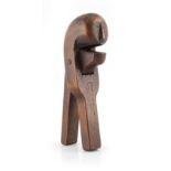 Property of a lady - a 19th century fruitwood treen nutcracker with carved primitive mask