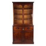 Property of a lady - an early Victorian mahogany two-part secretaire bookcase, 48.5ins. (123cms.)