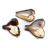 Property of a lady - three meerschaum type pipes, each in a fitted case (3).