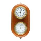 Property of a gentleman - a Sestrel brass cased bulkhead clock and matching aneroid barometer,