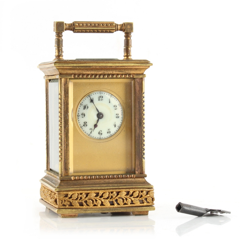 Property of a lady - a late 19th / early 20th century French brass cased miniature carriage clock