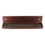 Property of a gentleman - a 19th century Stanley brass rolling ruler, in mahogany case.