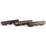 A private collection of model railway rolling stock - three Exley O-gauge tinplate carriages (two