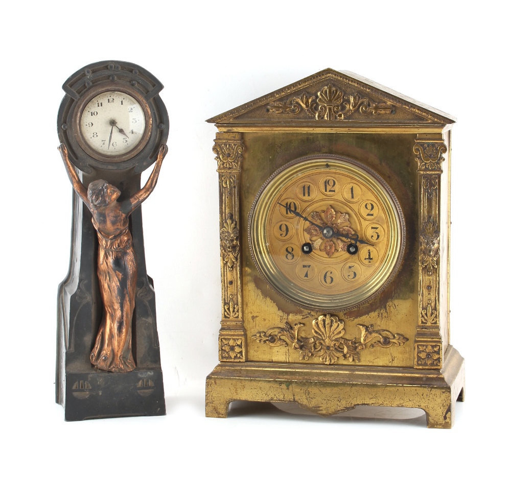 Property of a lady - a late 19th century gilt brass architectural cased mantel clock, striking on