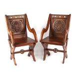 Property of a lady - a pair of late Victorian carved oak Glastonbury chairs (2).