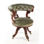 Property of a gentleman - a Victorian carved oak office swivel desk chair, with later green button