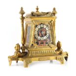 Property of a lady - a late 19th century French porcelain mounted Egyptian revival mantel clock, the
