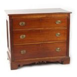 Property of a lady - a late 19th century North European cherrywood chest of three long graduated