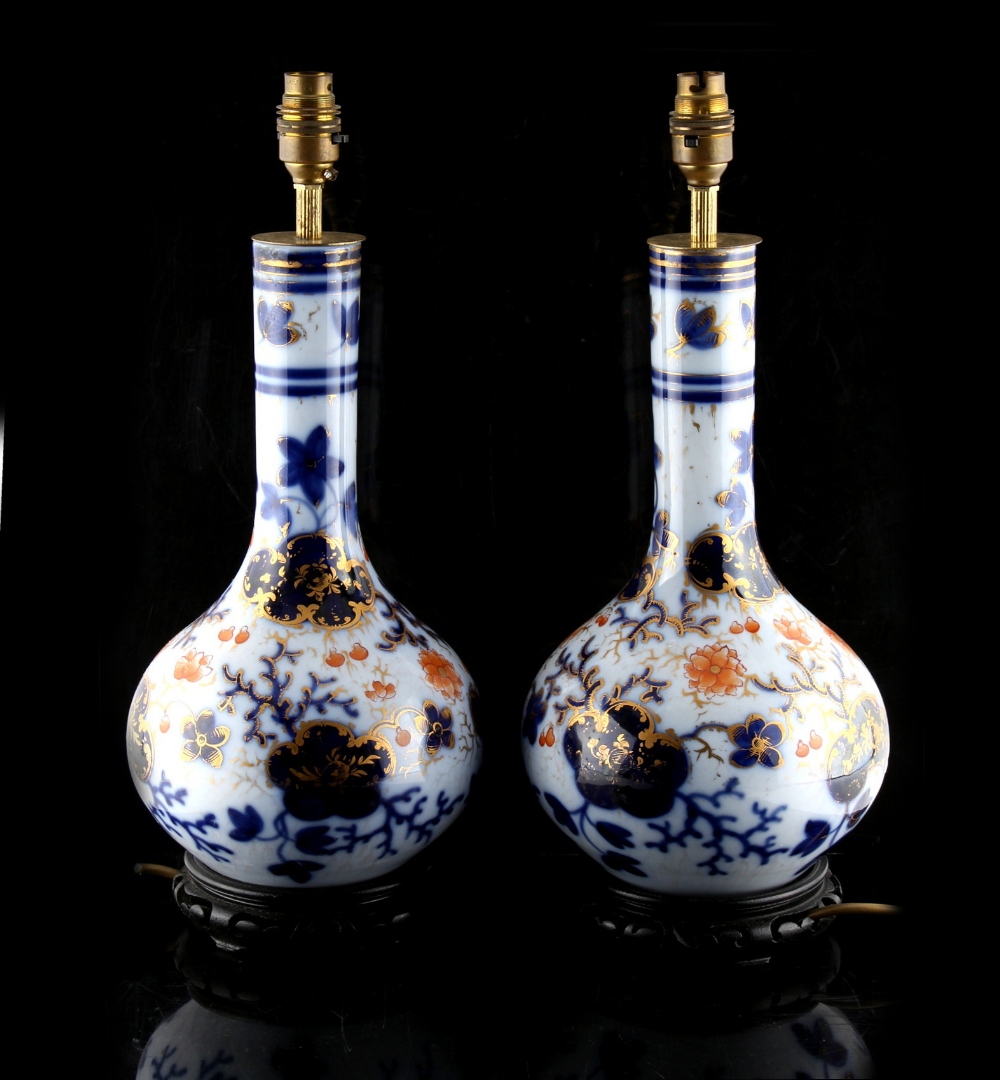 A pair of Victorian Japan pattern bottle vases, adapted as table lamps, each 17.3ins. (44cms.)