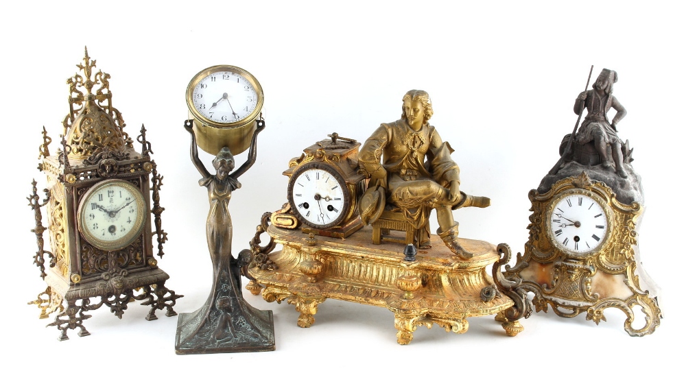 Property of a deceased estate - an Art Nouveau figural mantel clock, 14ins. (36cms.) high;