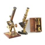 Property of a lady - a late 19th century French brass microscope by E. Hart & A. Praz, Paris;