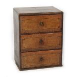 Property of a lady - a Continental walnut & parquetry inlaid chest of three drawers, parts 18th /