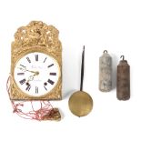 Property of a deceased estate - a 19th century French ornate brass comptoise clock, the two train