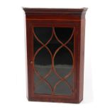 Property of a gentleman - a George III mahogany & boxwood strung corner wall cabinet with tracery