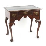 Property of a deceased estate - a George III oak lowboy, with leather inset top, 29.5ins. (75cms.)