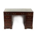 Property of a gentleman - a reproduction mahogany twin pedestal desk, with leather inset top, 48ins.