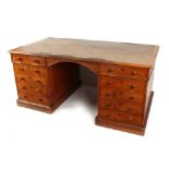 Property of a gentleman - a Victorian oak twin pedestal partner's desk, with inset top above ten