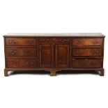 Property of a deceased estate - a late 18th century George III oak & mahogany banded dresser, 80.