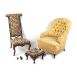 Property of a lady - a Victorian walnut & button upholstered armchair, with turned front legs &