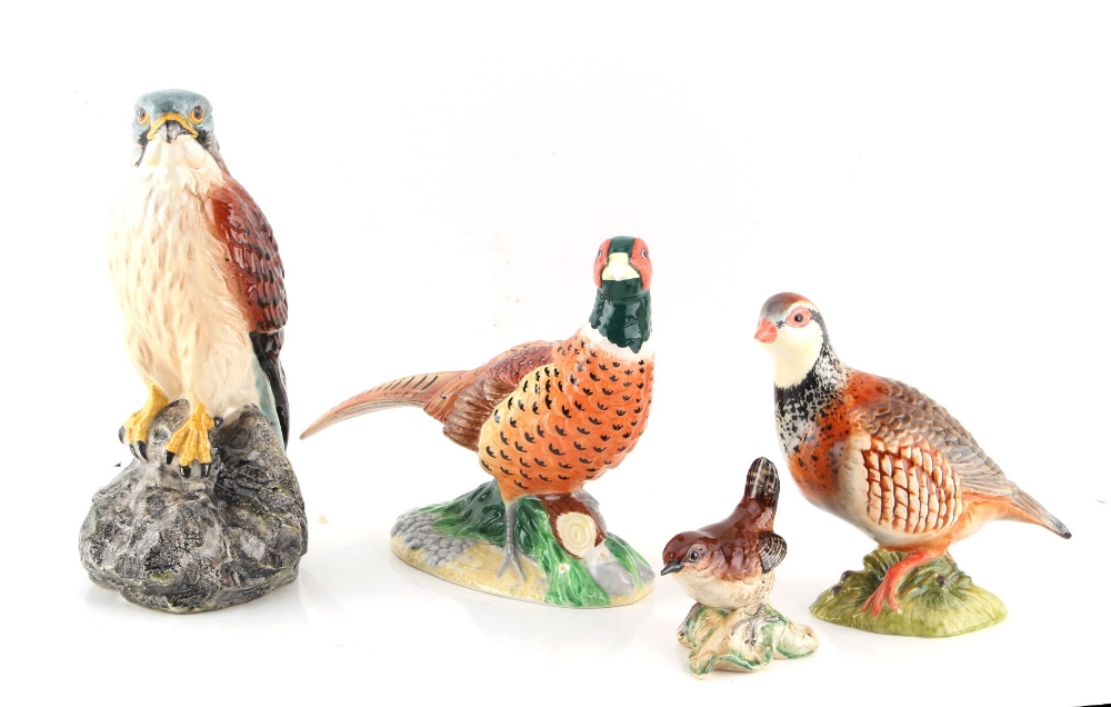 Property of a gentleman - four Beswick models of birds, comprising a Kestrel, a Wren, a Grouse and a