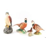 Property of a gentleman - four Beswick models of birds, comprising a Kestrel, a Wren, a Grouse and a