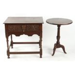Property of a gentleman - a carved oak side table, the frieze drawer with mask decoration, 28.75ins.