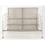 Property of a lady - an early 20th century grey painted iron 4'6" double bedstead, on wooden