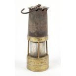 Property of a deceased estate - a brass miner's lamp, indistinctly stamped, maker's plaque missing.