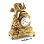 Property of a gentleman - a mid 19th century French ormolu cased mantel clock, surmounted by a