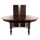 Property of a lady - a Victorian mahogany D-end wind-out extending dining table with two extra