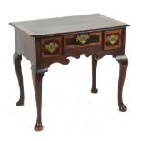 Property of a deceased estate - a mid 18th century oak & mahogany banded lowboy, with shaped apron &