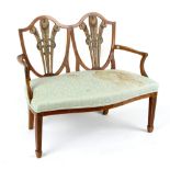 Property of a lady - an Edwardian painted satinwood double chair back settee, with Prince of Wales