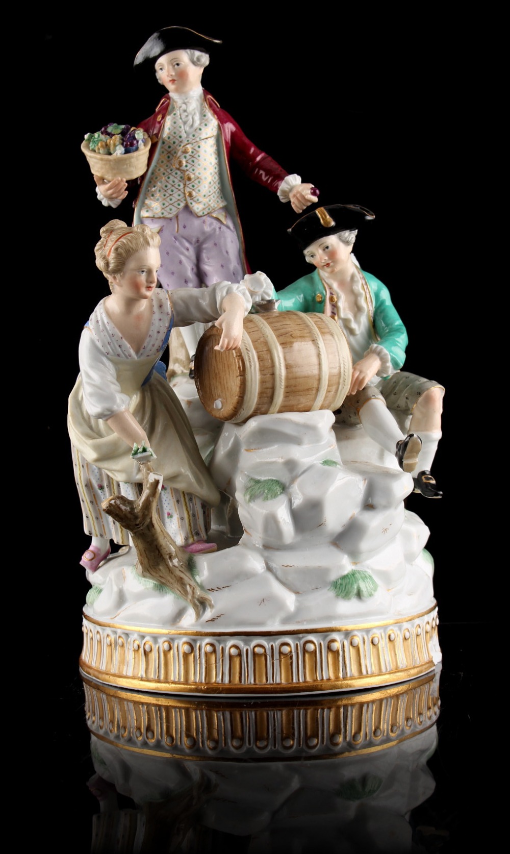 Property of a lady - a late 19th century Meissen group of Three Winemakers, after the model by