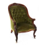 Property of a gentleman - a Victorian carved walnut & green button upholstered armchair, with