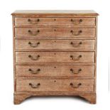 Property of a gentleman - a George III limed oak chest of six long graduated drawers, with brass