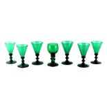 Property of a lady - a set of six 19th century 'Bristol' green glass wine glasses, one with small