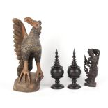 Property of a deceased estate - a Far Eastern carved wood model of a phoenix, 25.8ins. (65.5cms.)