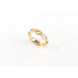 Property of a lady - a 22ct yellow gold wedding band or ring, of Celtic design, Birmingham 1979,