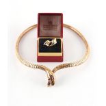 Property of a gentleman - a 9ct yellow gold snake necklace, with ruby eyes; together with a 9ct