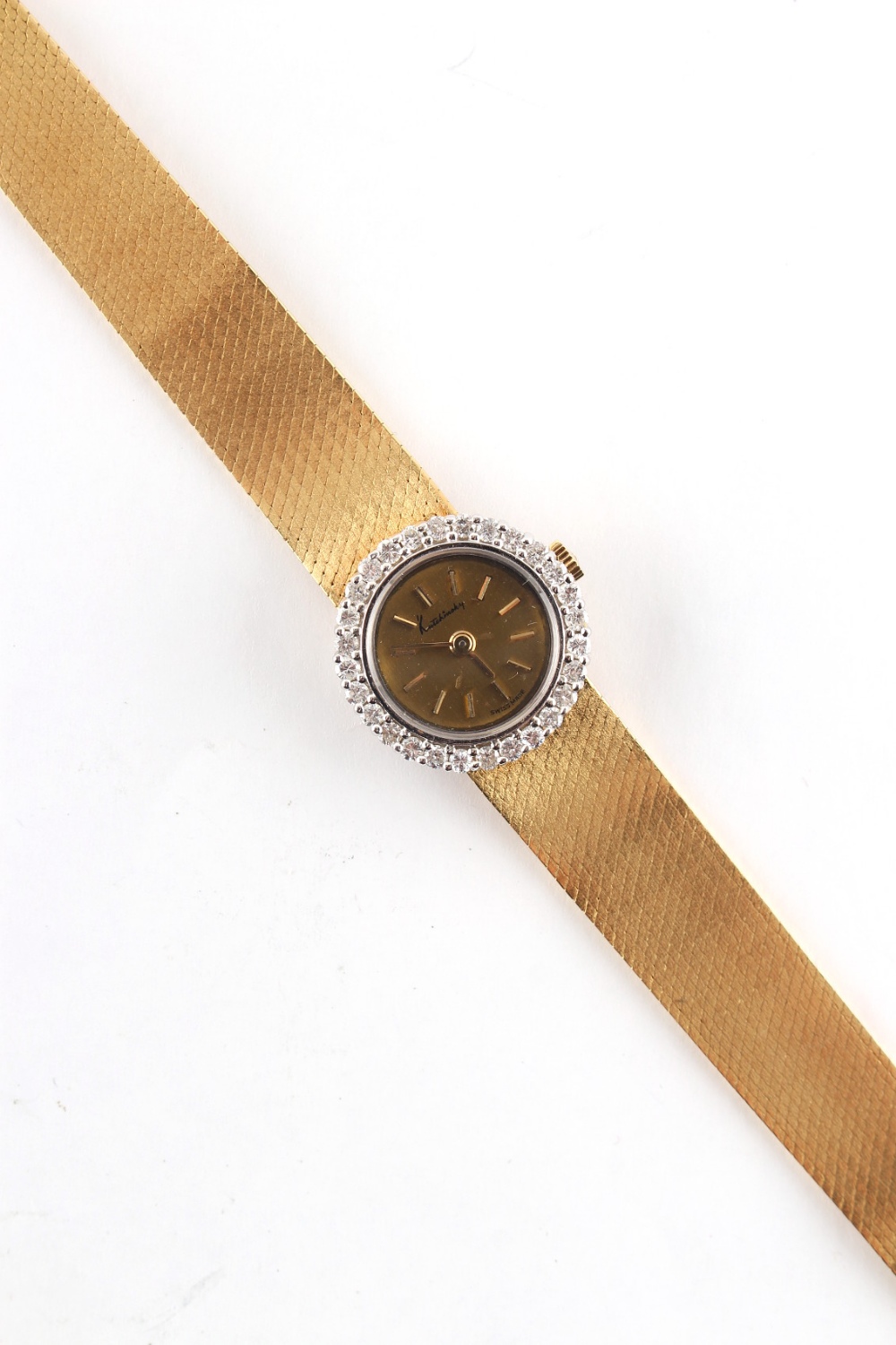 Property of a lady - a lady's Chopard for Kutchinsky 18ct gold wristwatch, the bezel set with - Image 3 of 3