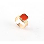 Property of a gentleman - a 9ct yellow gold carnelian signet ring, approximately 8.3 grams.
