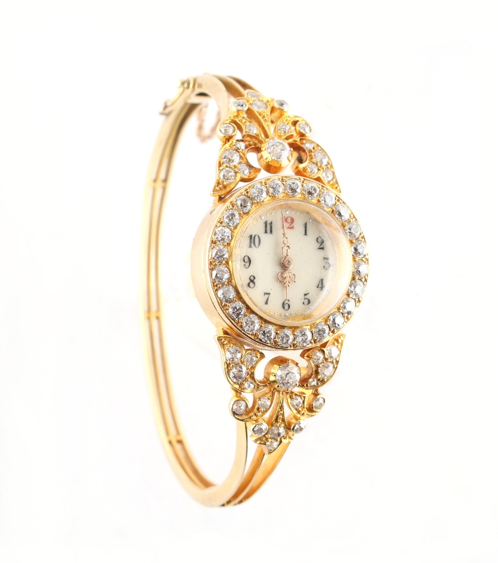 A lady's yellow gold (tests 12-18ct) diamond dress watch, set with Old European cut diamonds, the