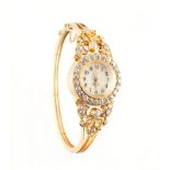 A lady's yellow gold (tests 12-18ct) diamond dress watch, set with Old European cut diamonds, the