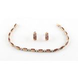Property of a lady - a 9ct yellow gold ruby & diamond bracelet; together with a matching pair of