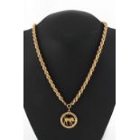 Property of a deceased estate - a 14ct gold Taurus pendant on 9ct gold rope link chain necklace,
