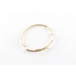 Property of a gentleman - a broken 9ct yellow gold bangle, approximately 5.0 grams.