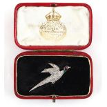 A diamond & enamel pheasant brooch, the pave set diamonds weighing an estimated 0.50 carat in total,